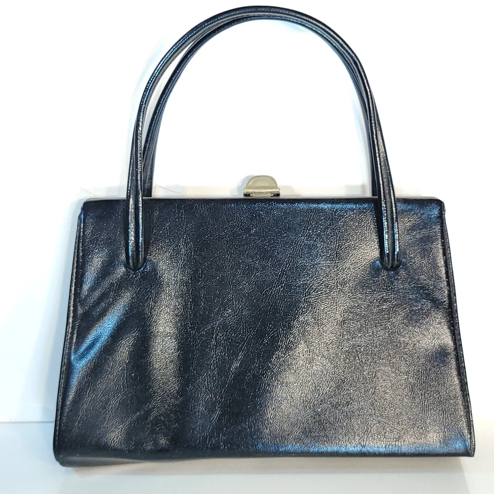 Classic Shape Vintage Handbag With Flip Lock Closure